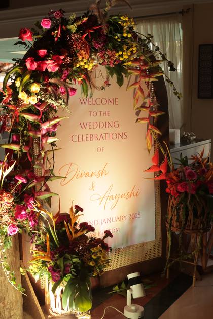 Signage and Floral detail — Arrival / Lobby decor — Taj Exotica